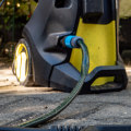 Is it ok to run hot water through a pressure washer?