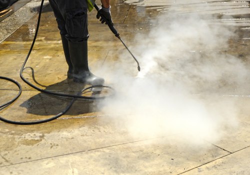 Are there any special considerations when using a hot water pressure washer?